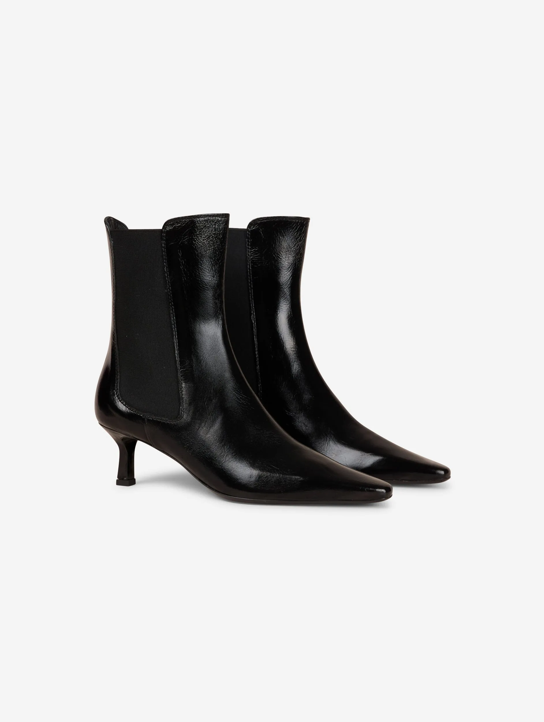 Elasticated black patent leather ankle boots